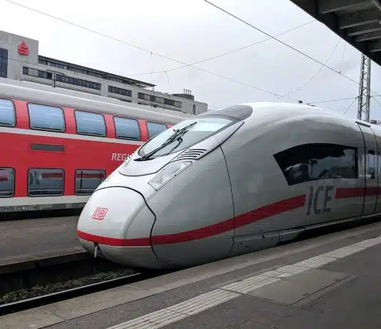 silver and red bullet train