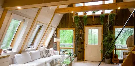 white sofa set near window